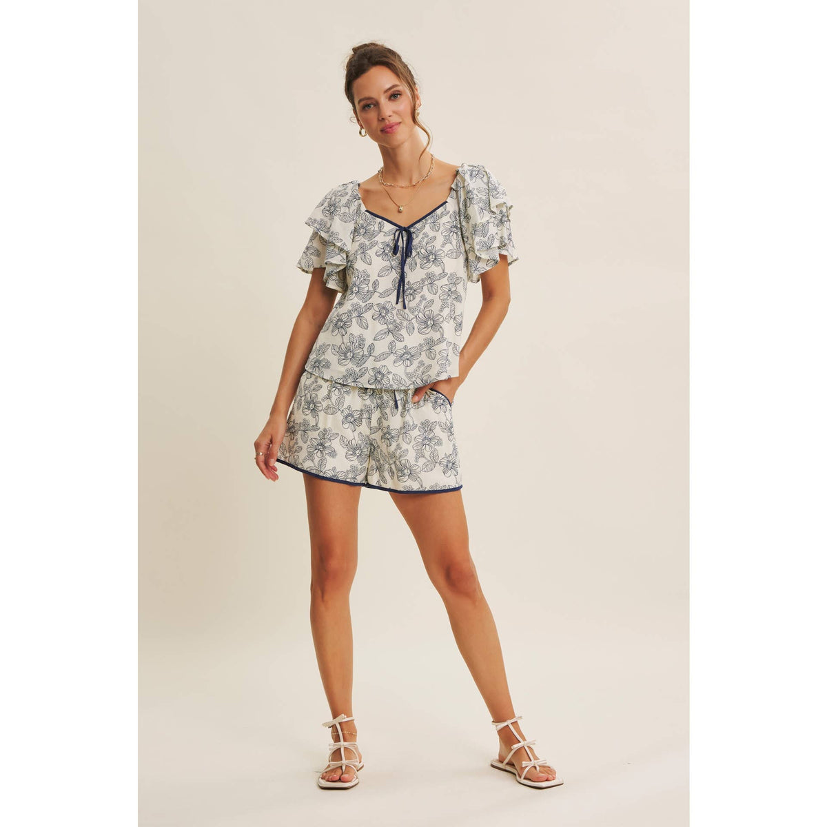 Sunlit Escapes Floral Ruffle Top
