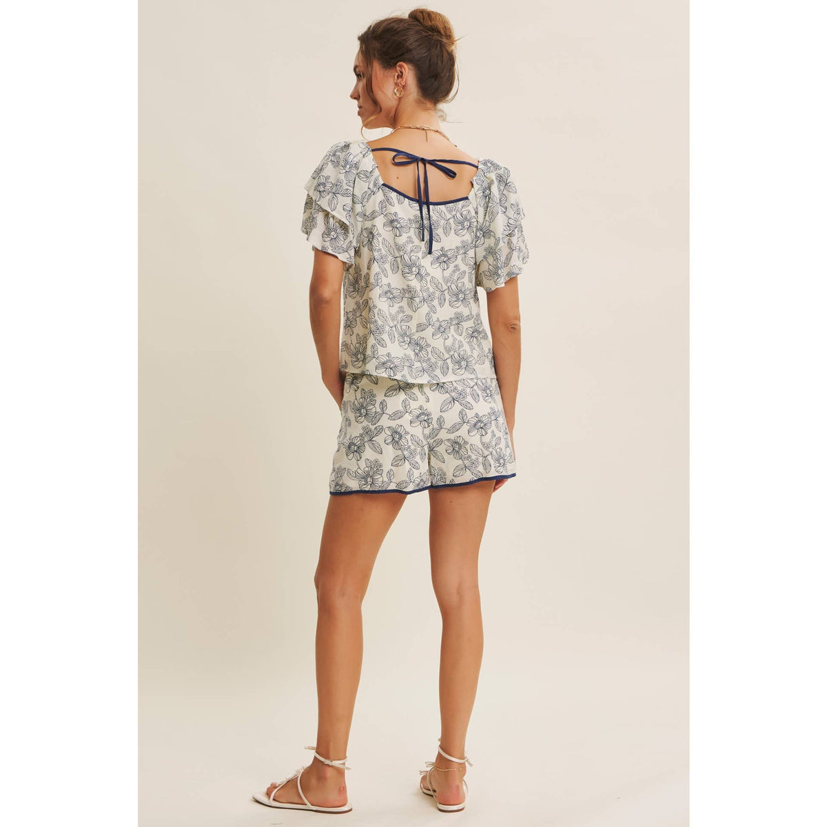 Sunlit Escapes Floral Ruffle Top