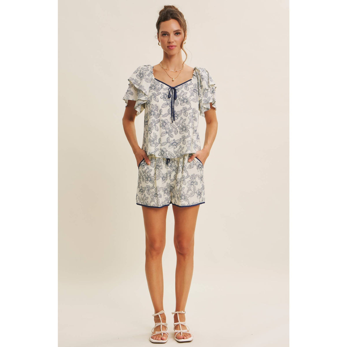 Sunlit Escapes Floral Ruffle Top