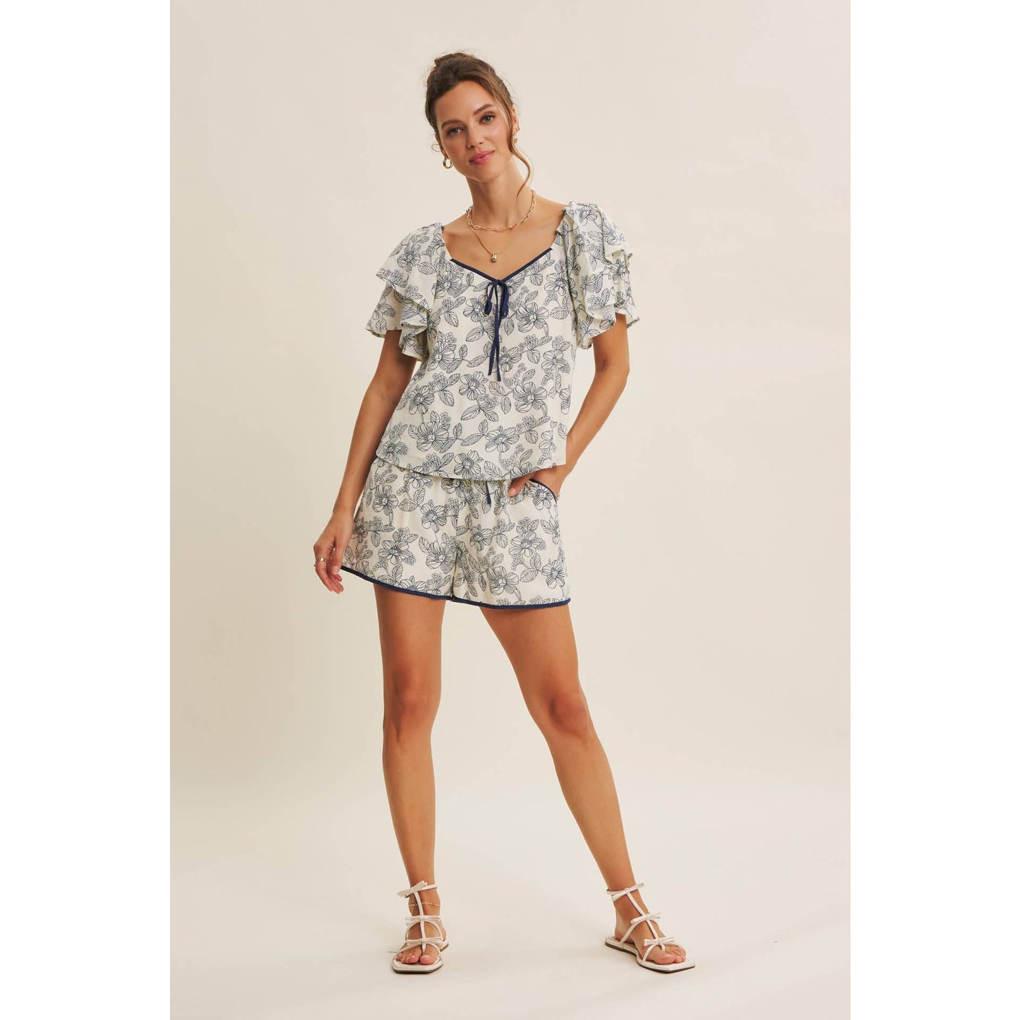 Sunlit Escapes Floral Ruffle Top