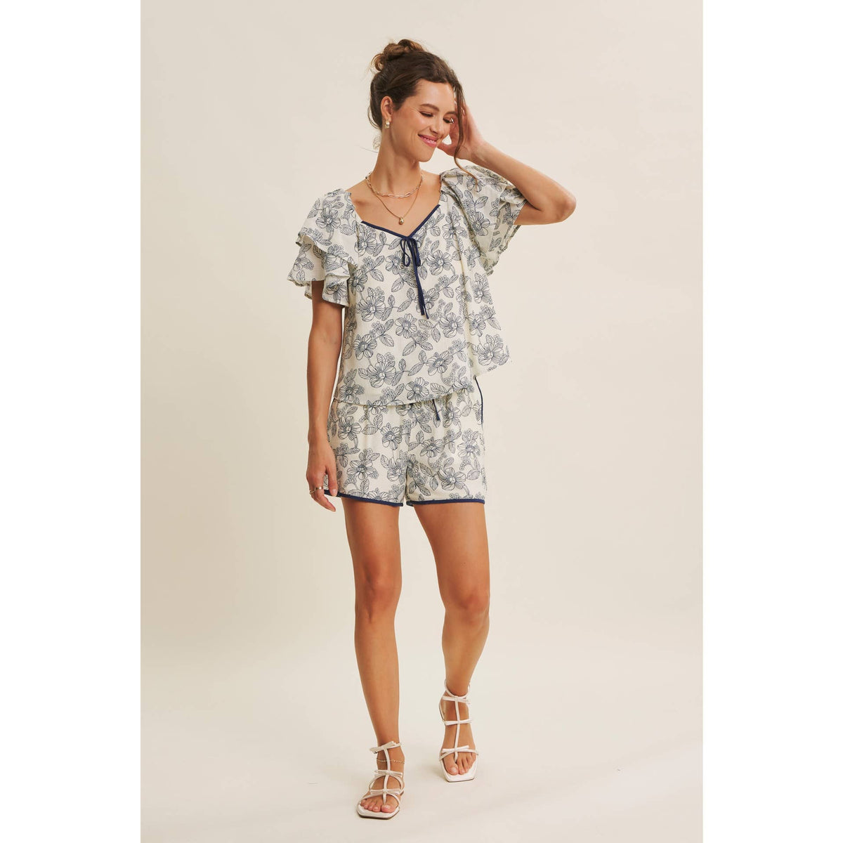 Sunlit Escapes Floral Ruffle Top